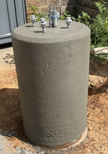 Pole base concrete placement